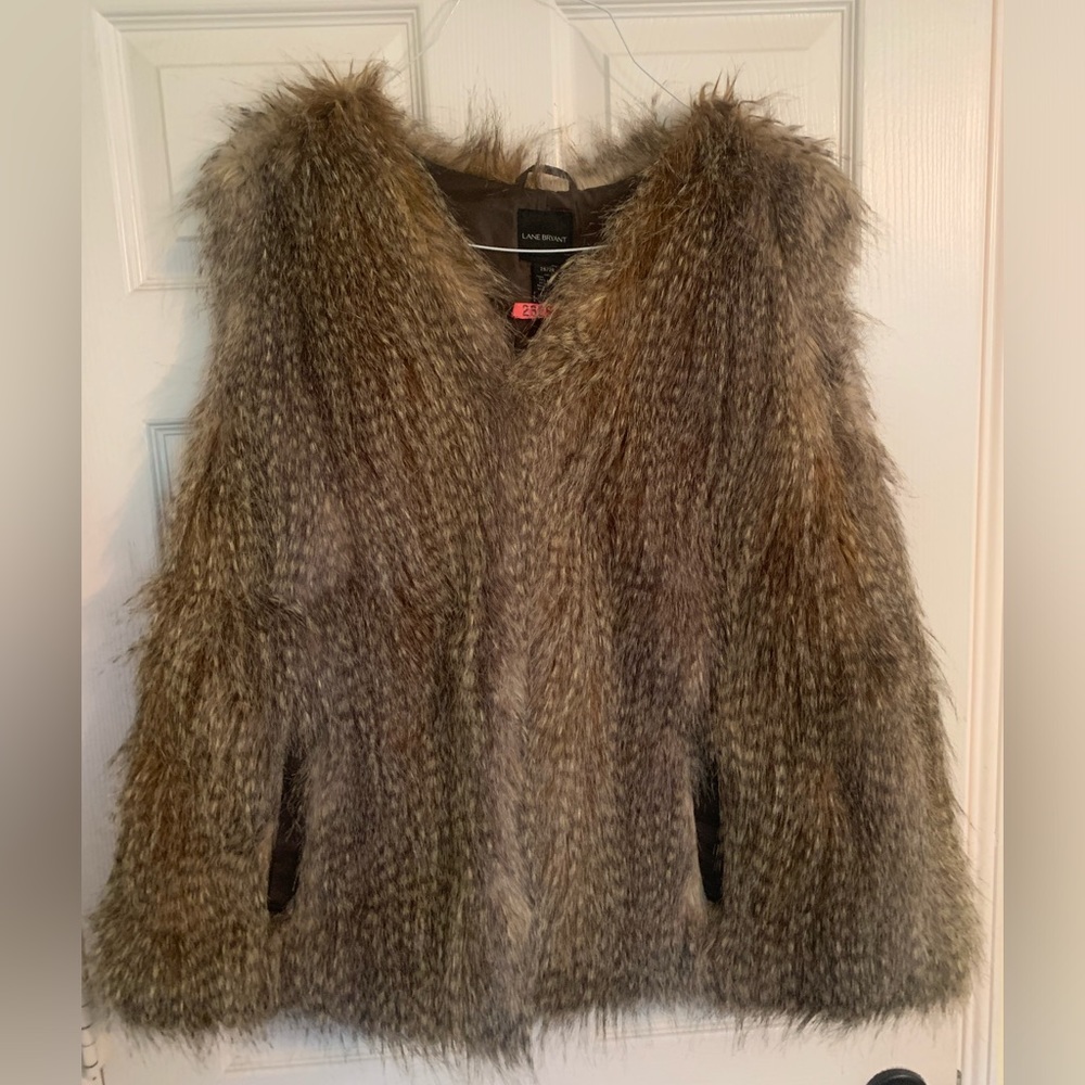 Faux fur vest with pockets, size 26/28